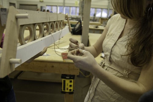 A student constructs a prototype of her chair