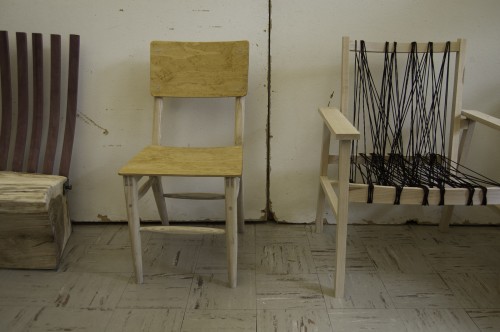 Finished chairs await critique at the final review