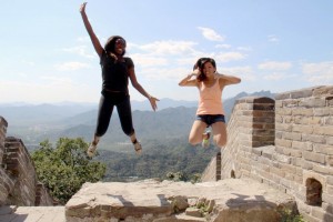 Nicole and her friend getting a “mid-air shot” taken at The Great Wall of China this past summer (2013). 