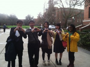 Our Japanese guests demonstrate the Oregon "O" with their UO undergraduate tour guide.