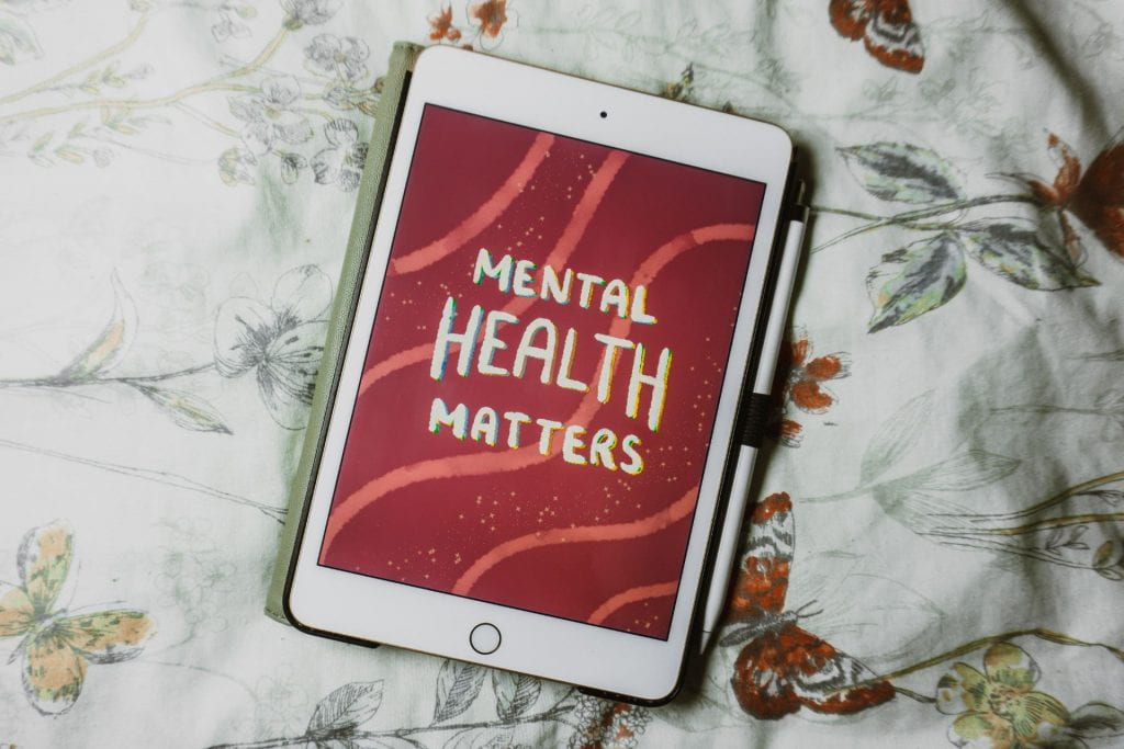 Digital illustration that states, "Mental Health Matters" on an iPad.