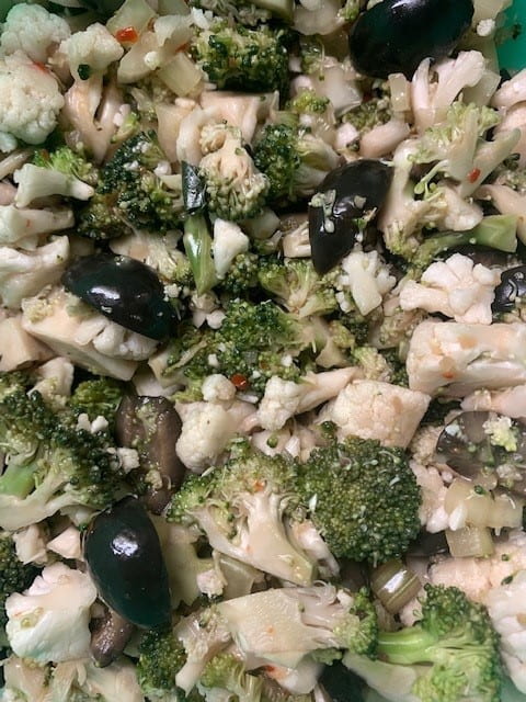 Finely chopped broccoli, cauliflower, and black olives