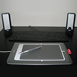 Speakers, keyboard, and tablet with stylus