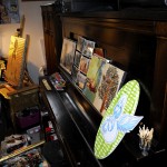 Piano with photos and belongings