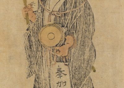 Large votive slip on blank page. Faded image of red creature with hornes, black hair, dressed in black and holding a drum with parasol strapped to back.